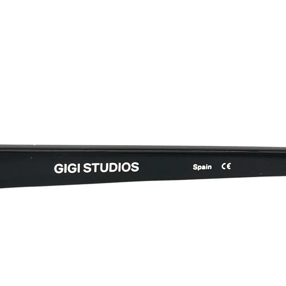 Gigi Studios Eyeglasses Frames ANALOG 6879/0 Black White Striped Round 52-18-140